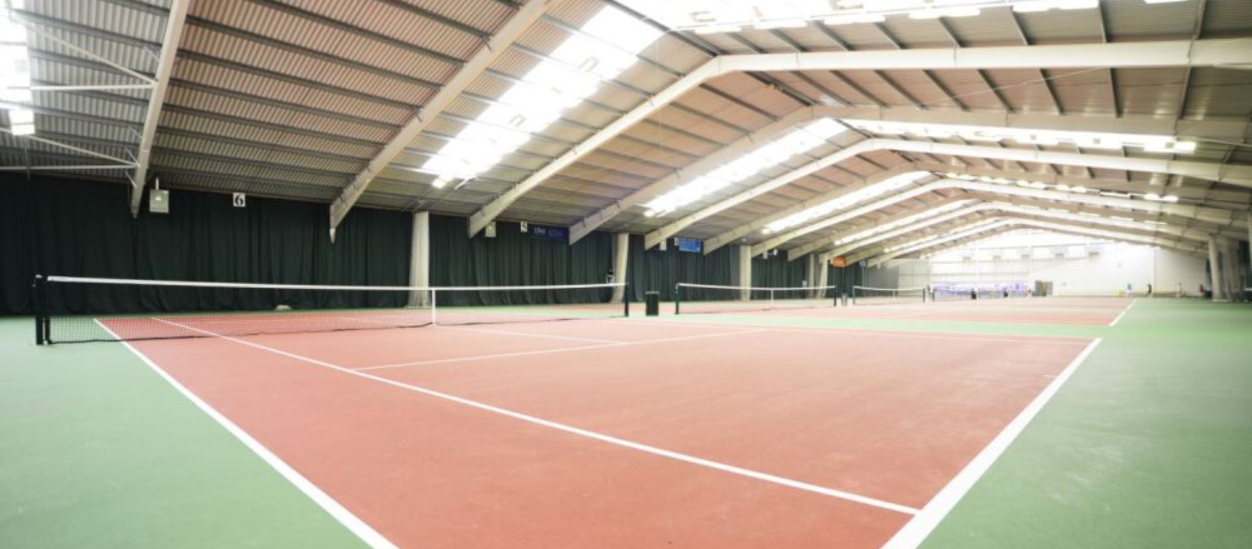 photo of indoor tennis courts