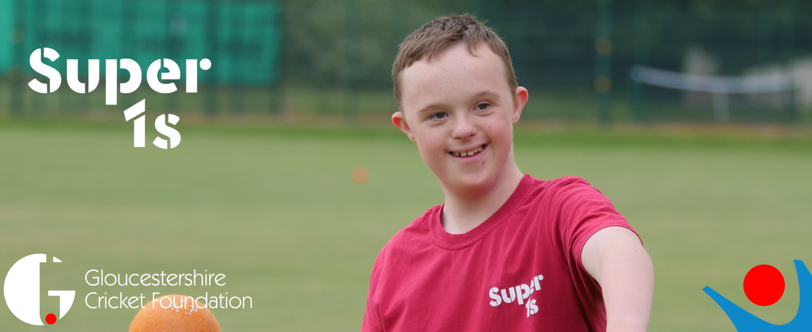 Picture showing young adult in red t-shirt, holding orange cricket ball. Super1s and Gloucestershire Cricket Foundation logos in corners