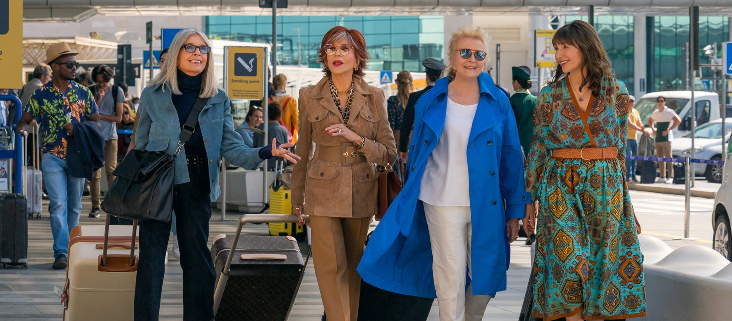 Diane Keaton, Jane Fonda, Candice Bergen and Mary Steenburgen walking through an airport terminal