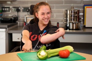 A student attends an Adult Community Learning cookery class