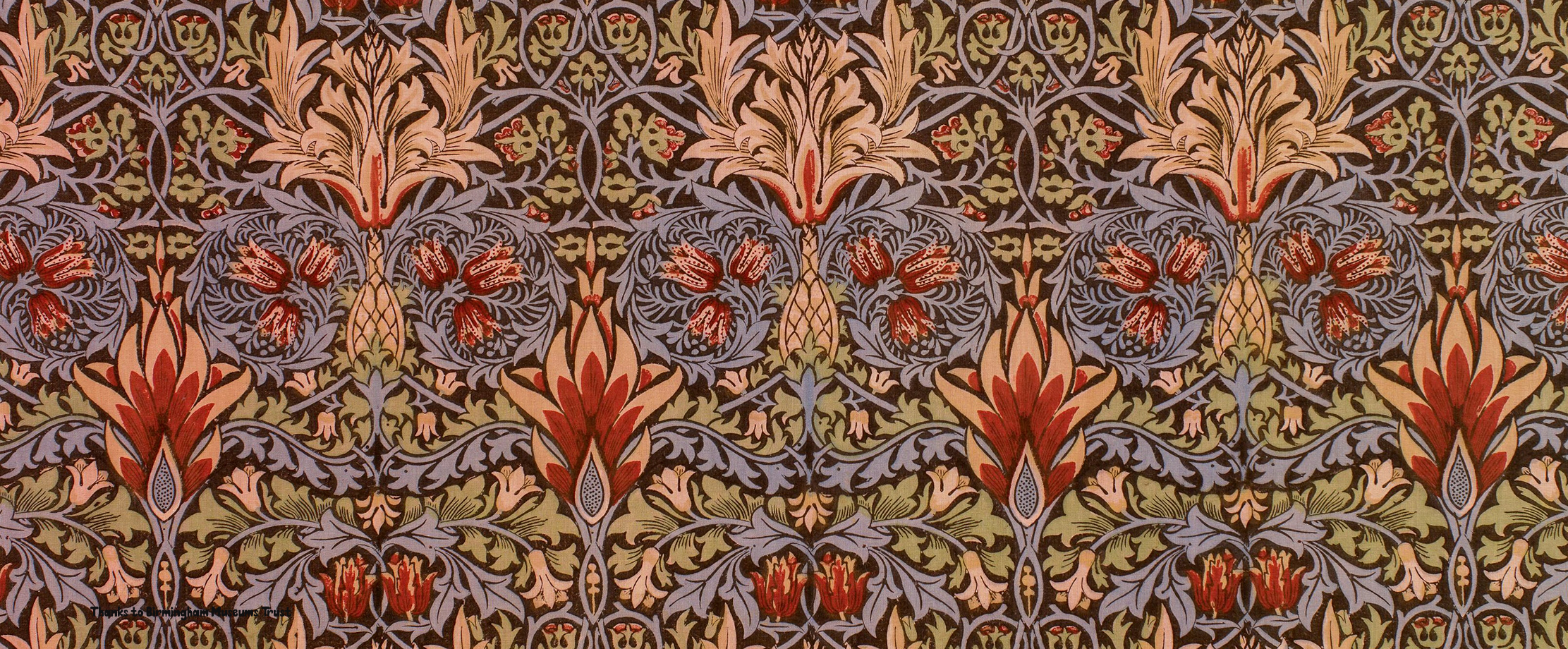 This is a beautiful patterned wallpaper designs with organic shapes in reds, greens and blues