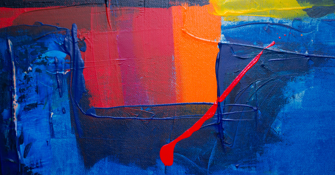 This is a beautiful abstract painting. There are deep blue colours, and a splash of red which runs vertical. In the top left are square shapes with oranges and reds