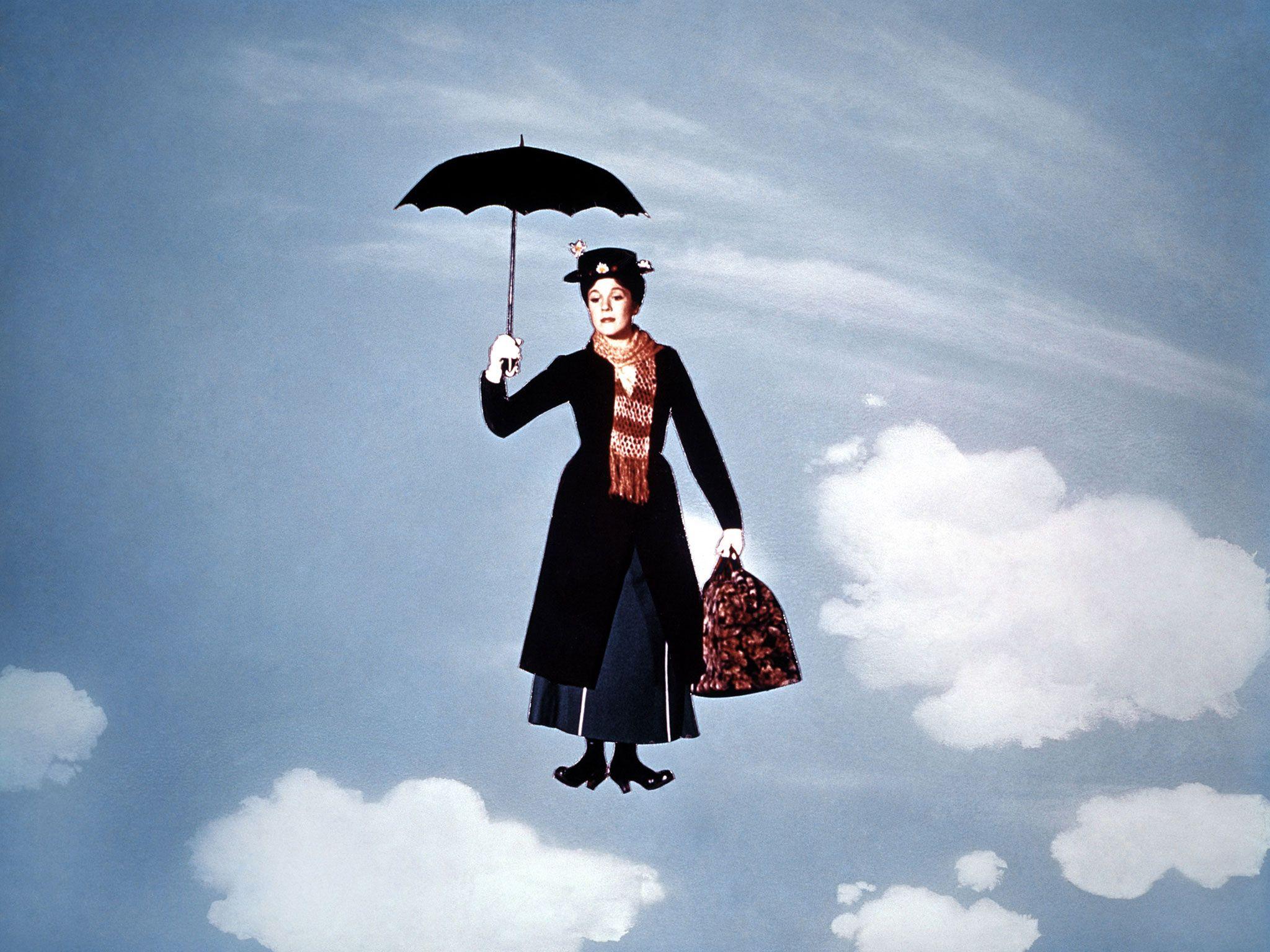 Mary Poppins floating in the sky with her umbrella