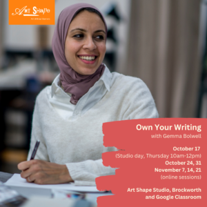 This is a photograph of a smiling woman in a headscarf, writing. The scarf is purple and she is wearing a white shirt 