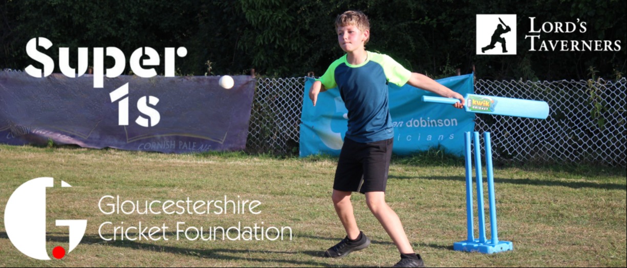 Young cricket player hitting a ball with a cricket bat