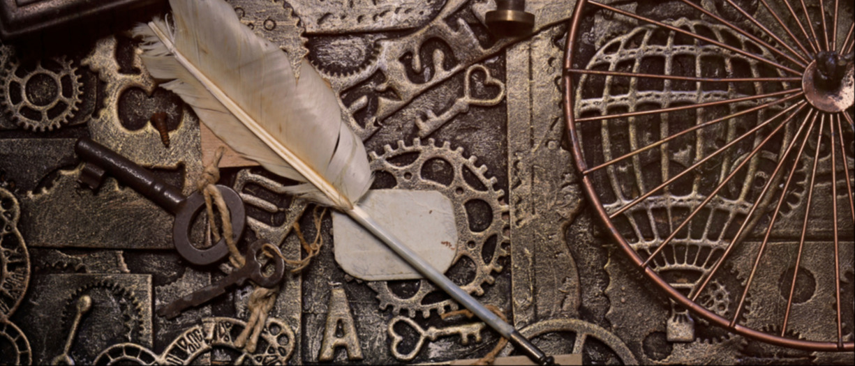 This is a collection of steampunk associated items including a quill and keys
